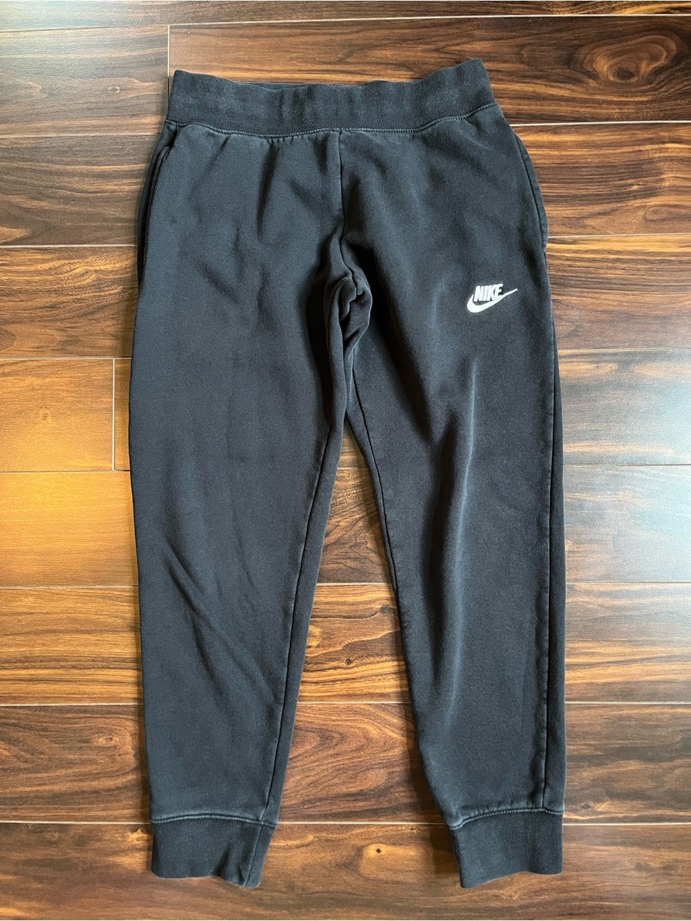 Nike Kid’s Black Jogger Sweatpants with White Swoosh Logo, M